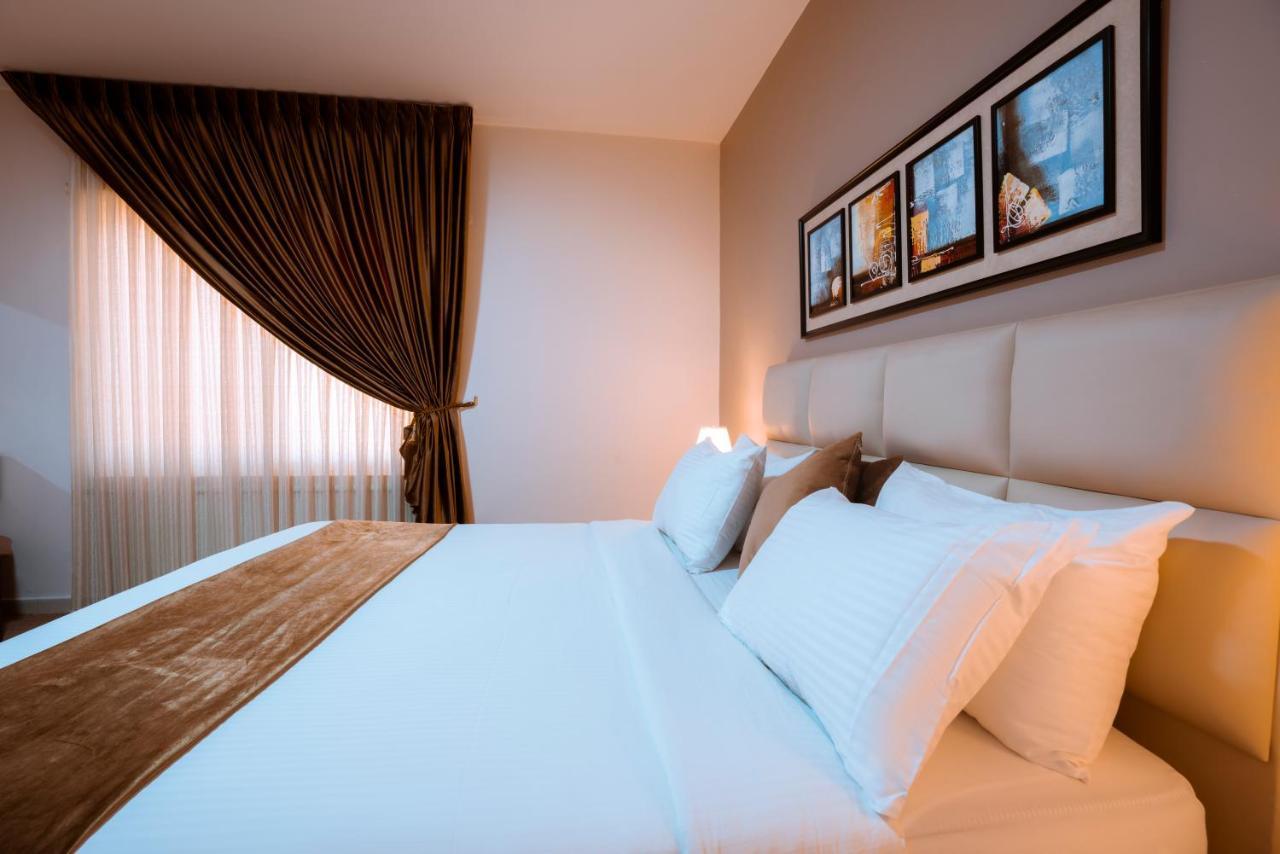 Rawa Hotel Suites Аман Екстериор снимка