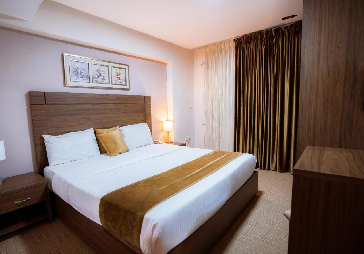 Rawa Hotel Suites Аман Екстериор снимка