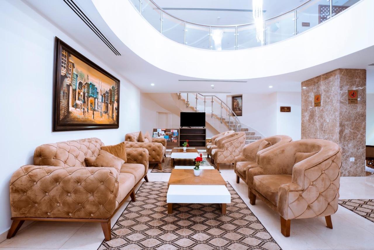 Rawa Hotel Suites Аман Екстериор снимка