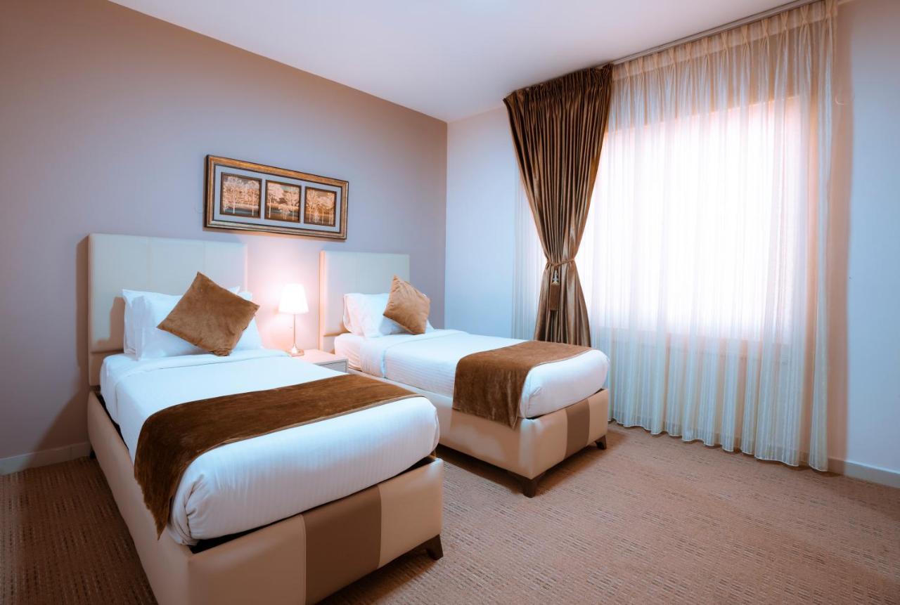 Rawa Hotel Suites Аман Екстериор снимка