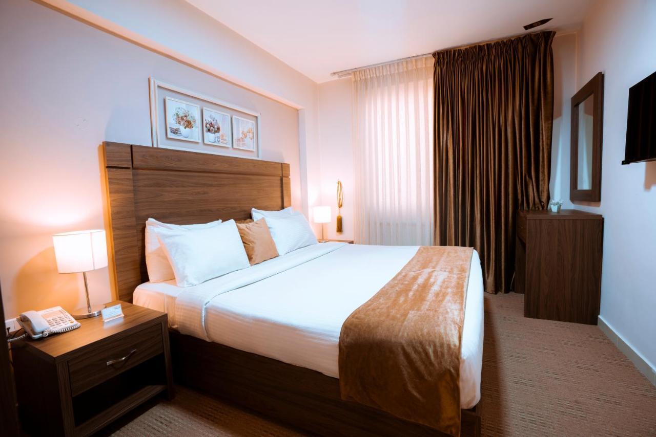 Rawa Hotel Suites Аман Екстериор снимка