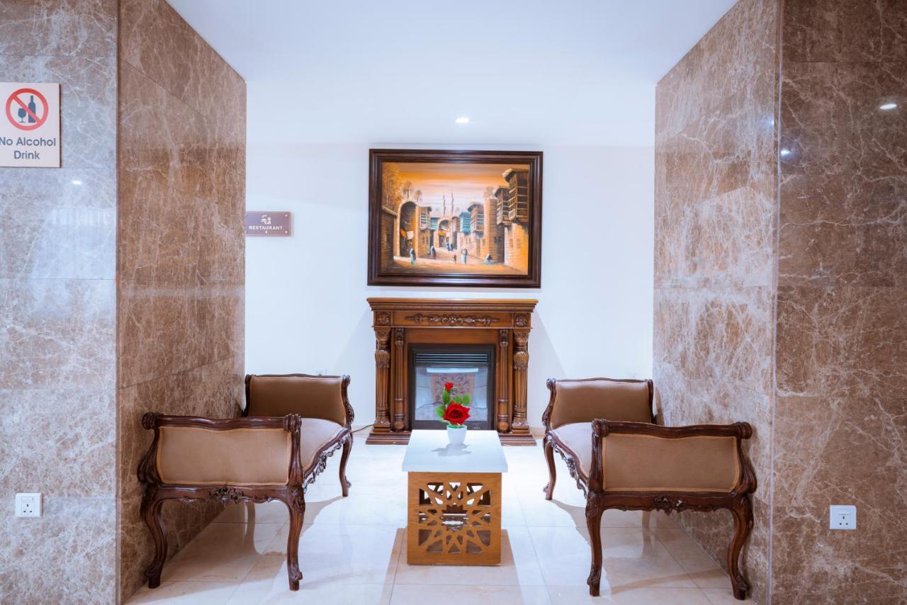 Rawa Hotel Suites Аман Екстериор снимка
