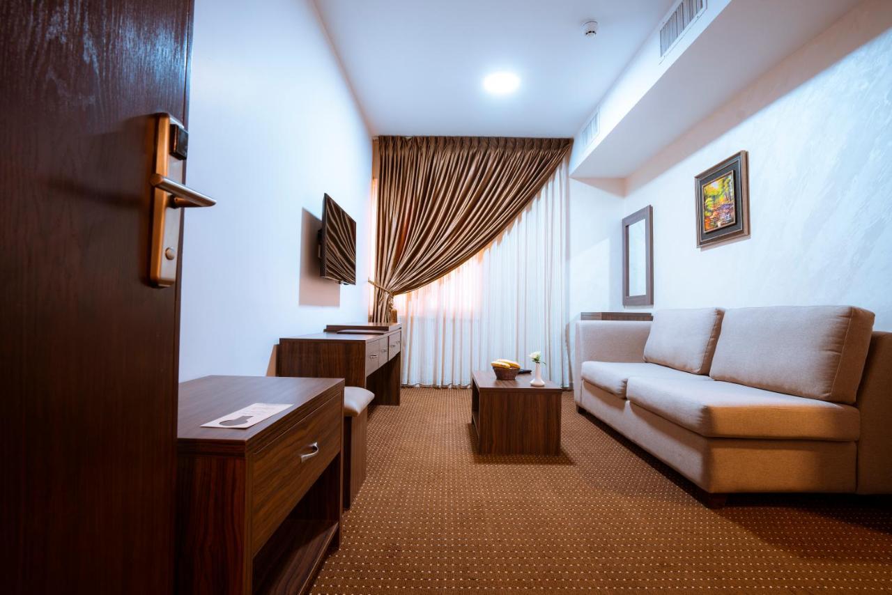 Rawa Hotel Suites Аман Екстериор снимка