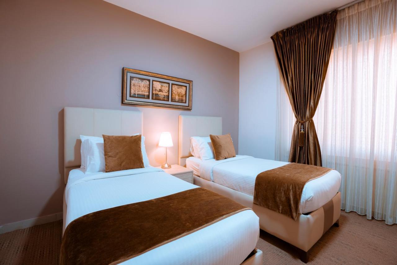 Rawa Hotel Suites Аман Екстериор снимка