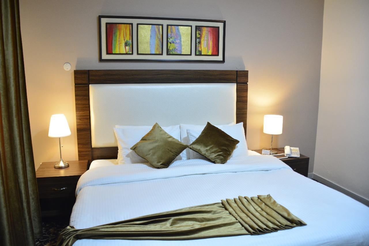 Rawa Hotel Suites Аман Екстериор снимка