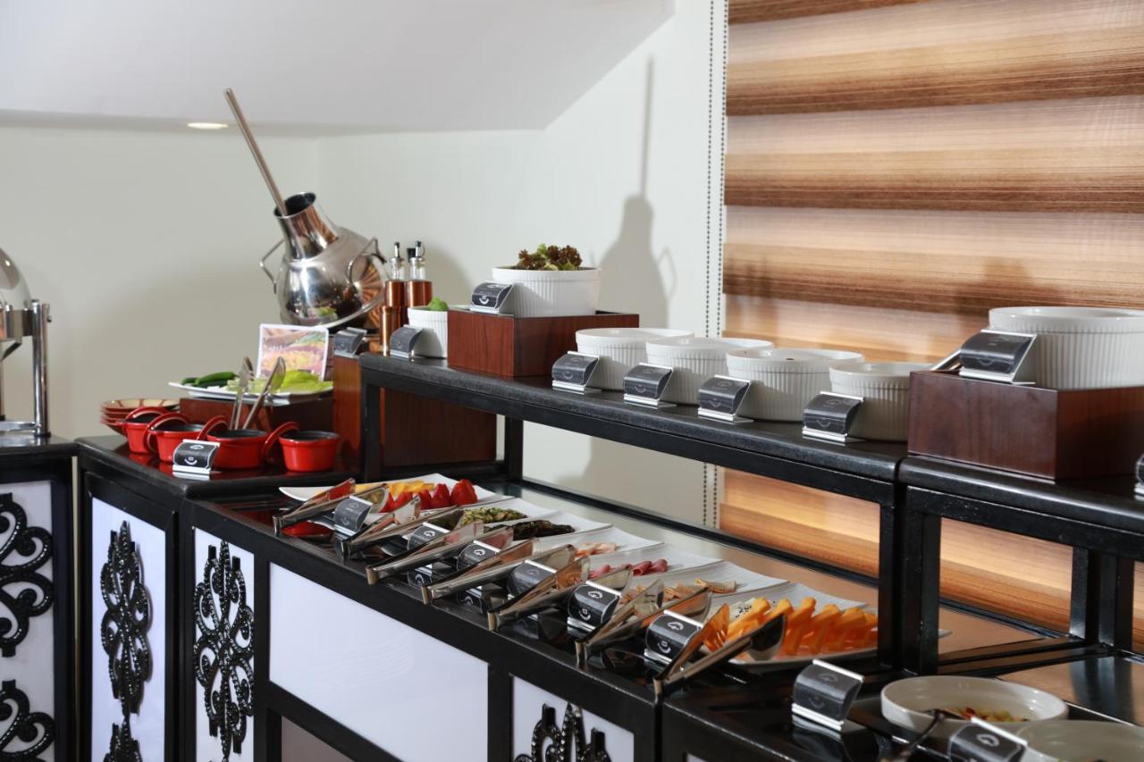 Rawa Hotel Suites Аман Екстериор снимка