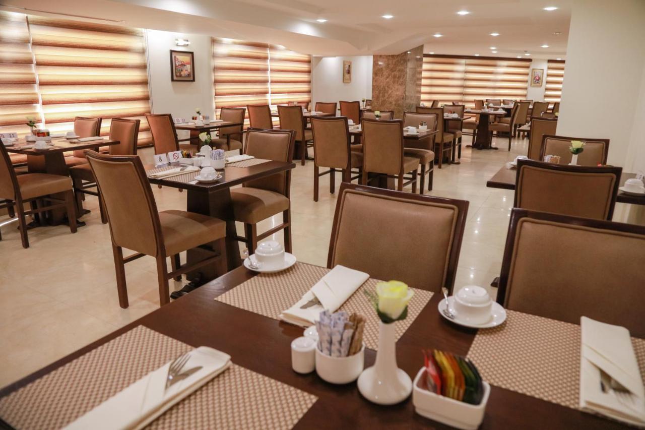 Rawa Hotel Suites Аман Екстериор снимка