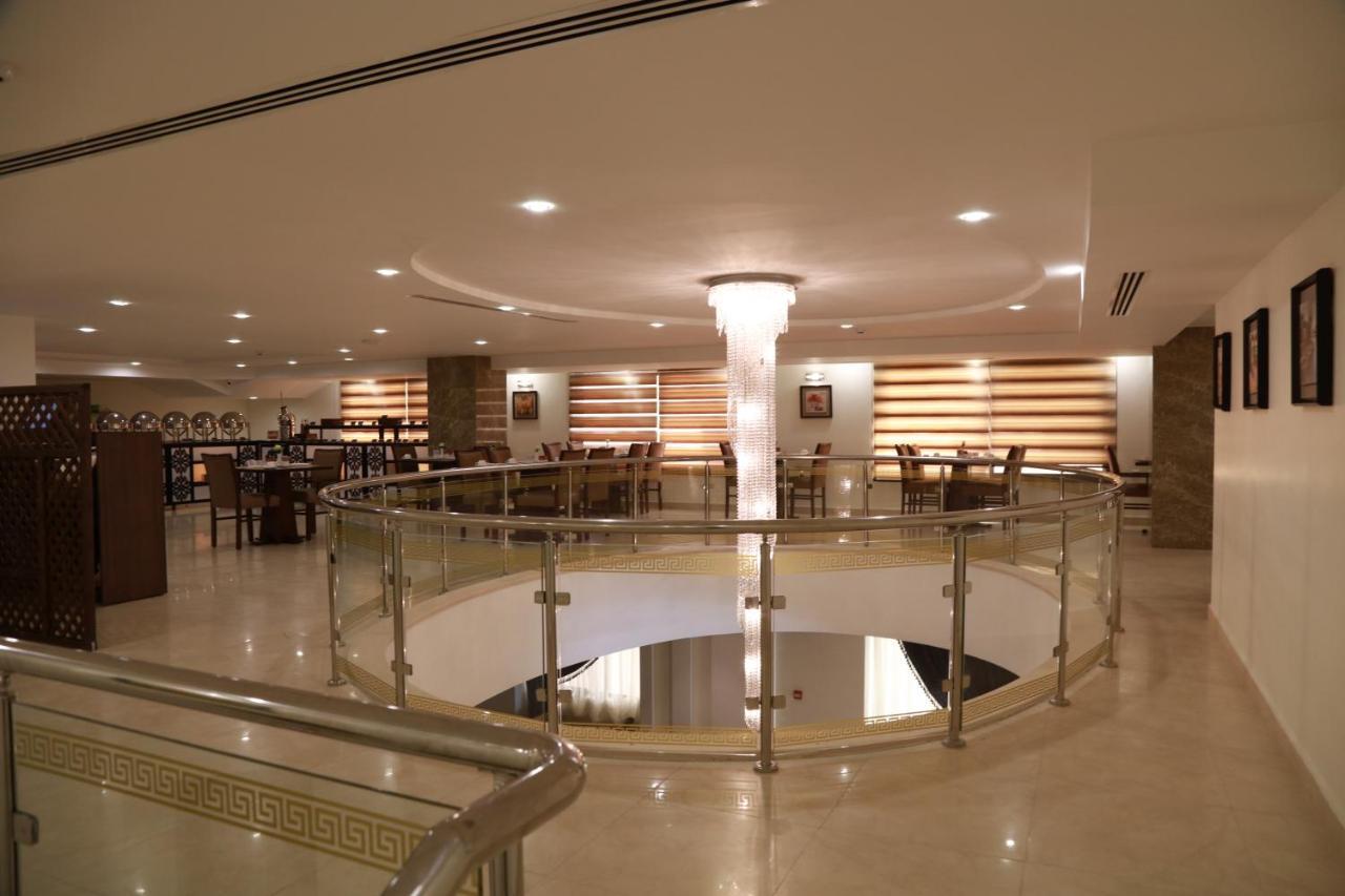 Rawa Hotel Suites Аман Екстериор снимка