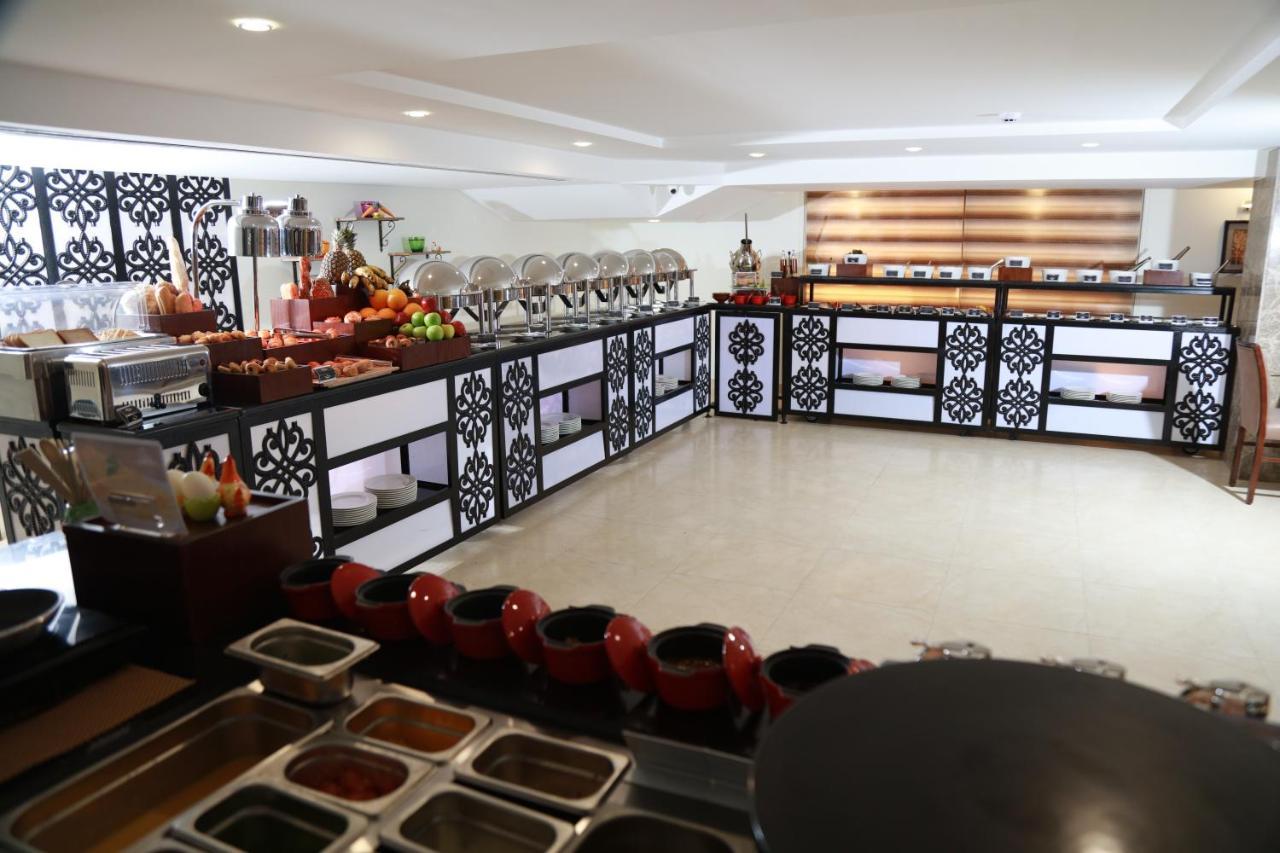 Rawa Hotel Suites Аман Екстериор снимка