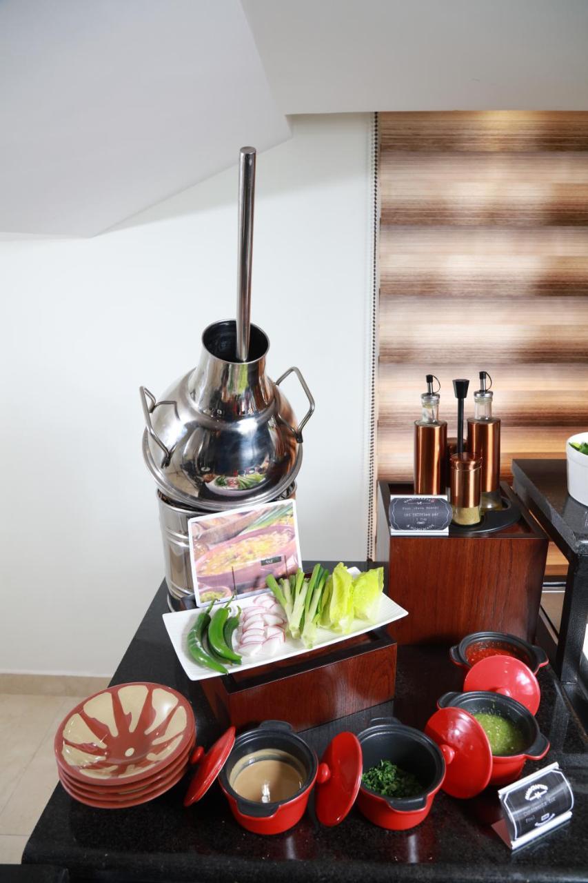 Rawa Hotel Suites Аман Екстериор снимка